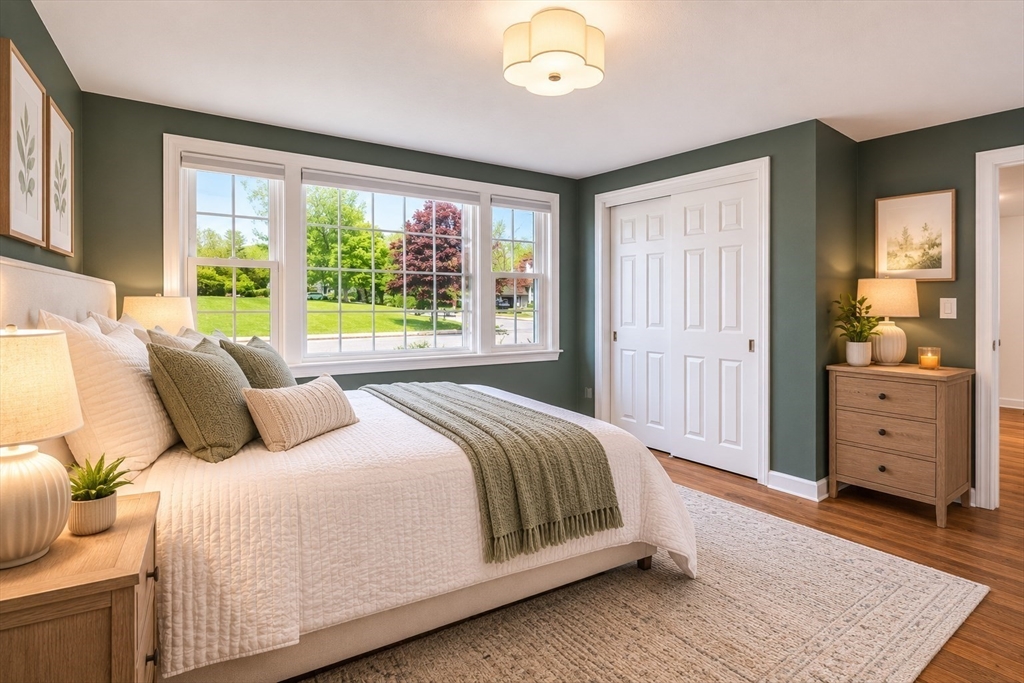 11 Longmeadow Road Medfield, MA 02052 - Photo 21 of 39 a bedroom with a large bed and a window