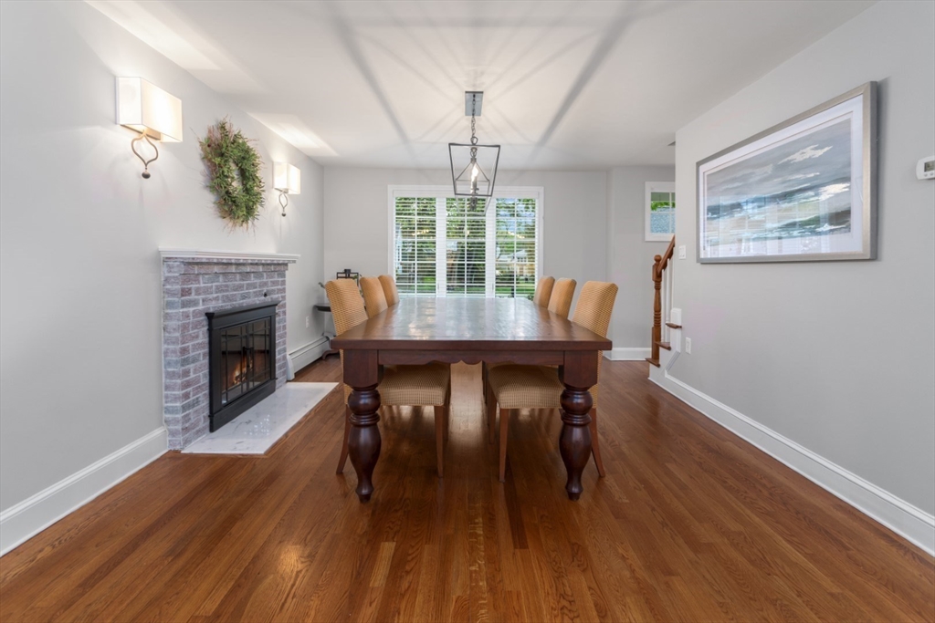 32 Sturges Road Reading, MA 01867 - Photo 17 of 39 a view of a dining room with furniture window and wooden floor