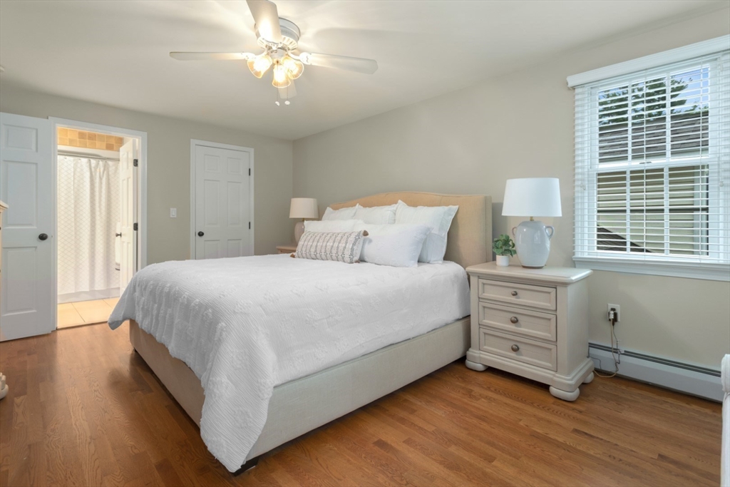 32 Sturges Road Reading, MA 01867 - Photo 20 of 39 a bedroom with a bed and a window