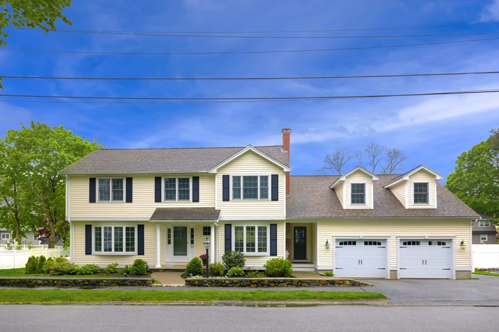 32 Sturges Road Reading, MA 01867 - Photo 2 of 39 front view of a house with a yard