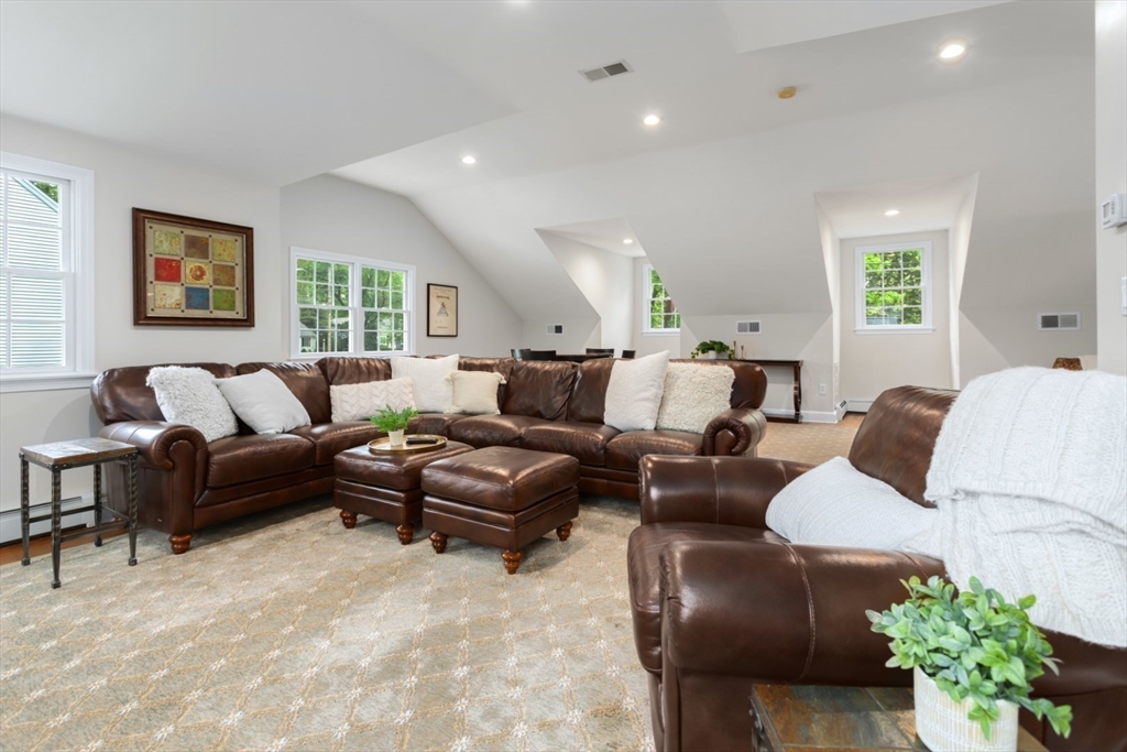 32 Sturges Road Reading, MA 01867 - Photo 28 of 39 a living room with furniture and a large window