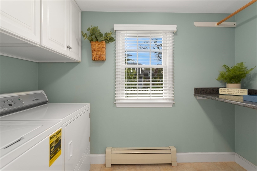 32 Sturges Road Reading, MA 01867 - Photo 32 of 39 a utility room with dryer and washer