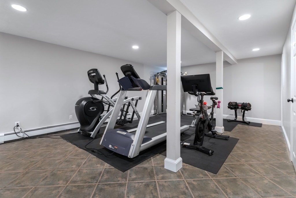 32 Sturges Road Reading, MA 01867 - Photo 34 of 39 a view of a room with gym equipment