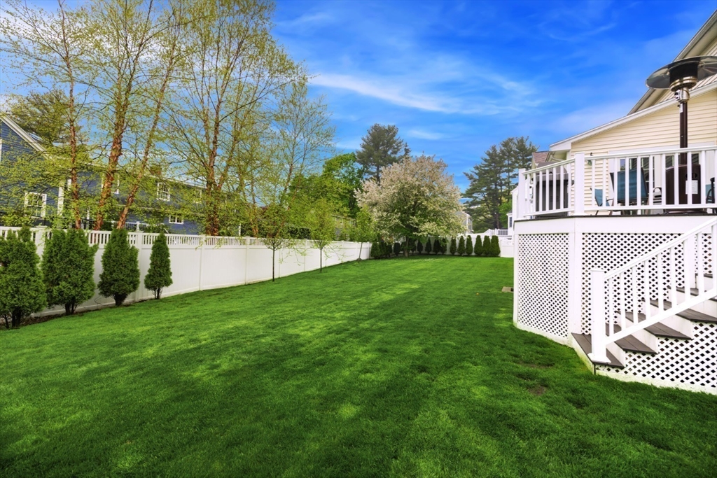 32 Sturges Road Reading, MA 01867 - Photo 39 of 39 a view of a house with a yard