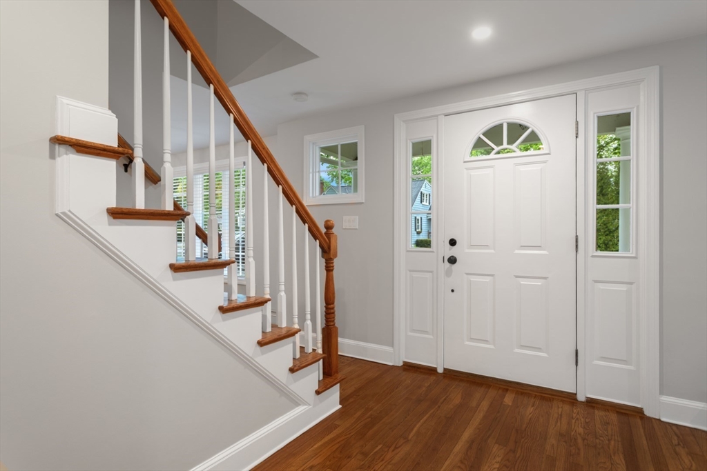 32 Sturges Road Reading, MA 01867 - Photo 4 of 39 a view of an entryway with wooden floor