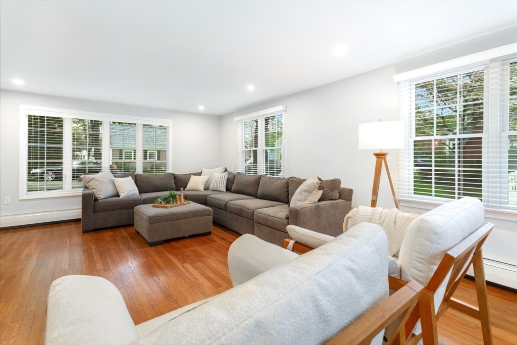 32 Sturges Road Reading, MA 01867 - Photo 6 of 39 a living room with furniture and a large window