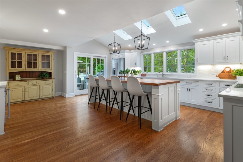 32 Sturges Road Reading, MA 01867 - Photo 9 of 39 a view of a dining room with furniture window and wooden floor