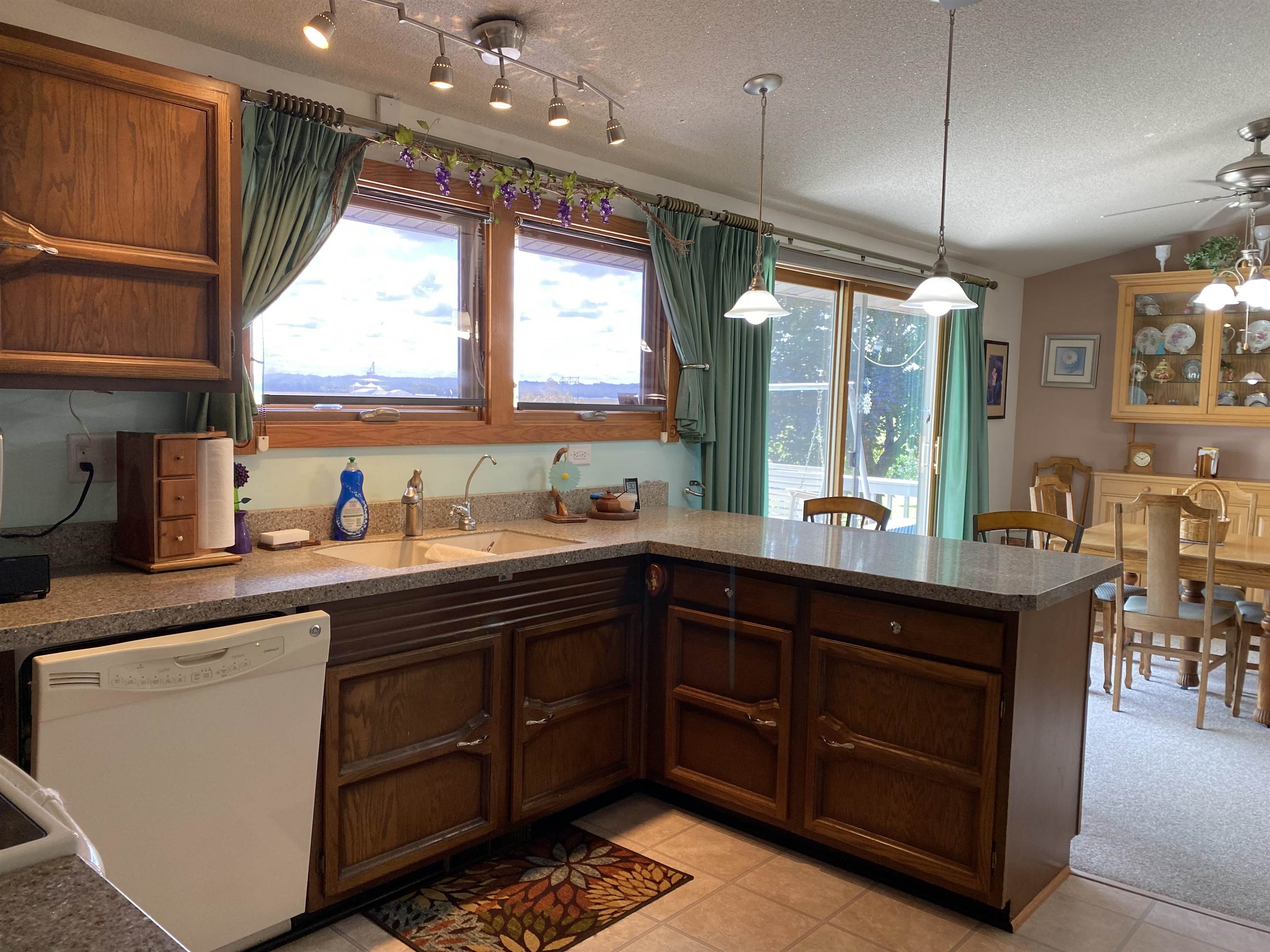 2491 Il Route Thomson, IL 61285 - Photo 5 of 20 a kitchen with a sink window and cabinets