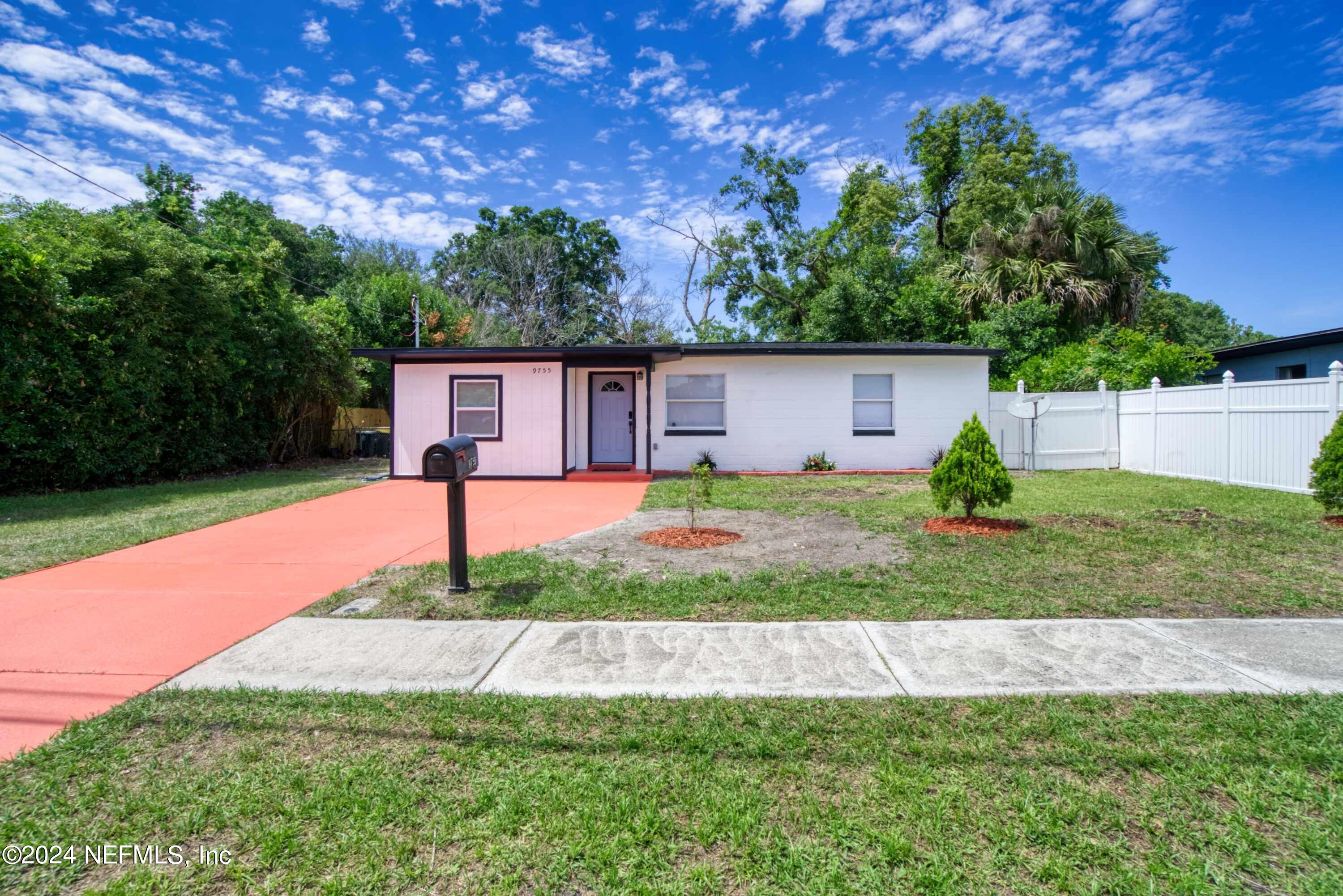 9755 Hogan Road Jacksonville, FL 32246 - Photo 1 of 41 front