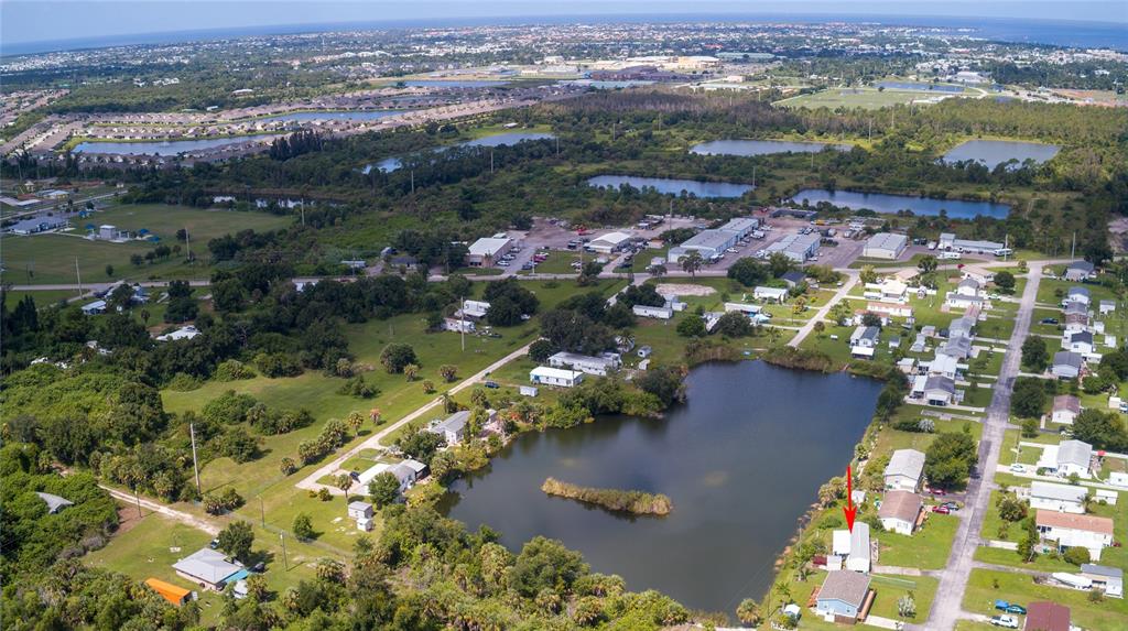2811 Carl Avenue Punta Gorda, FL 33950 - Photo 8 of 8 an aerial view of residential houses with outdoor space