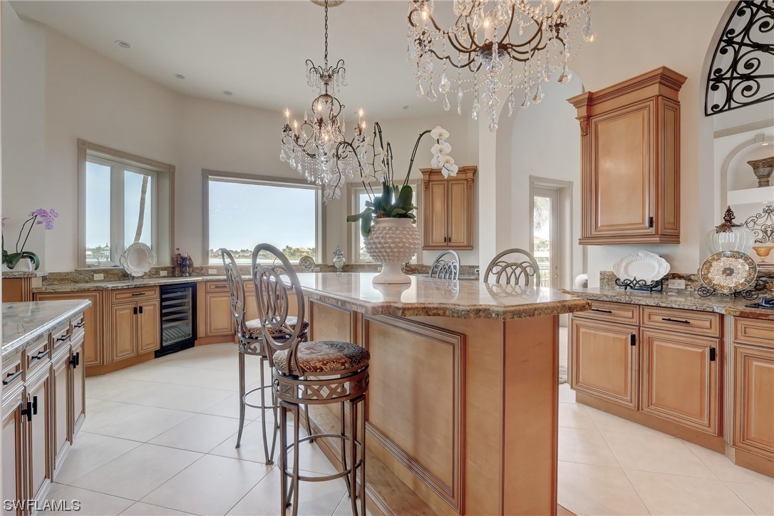 5960 Harborage Drive Fort Myers, FL 33908 - Photo 12 of 32 a kitchen with cabinets a sink and appliances