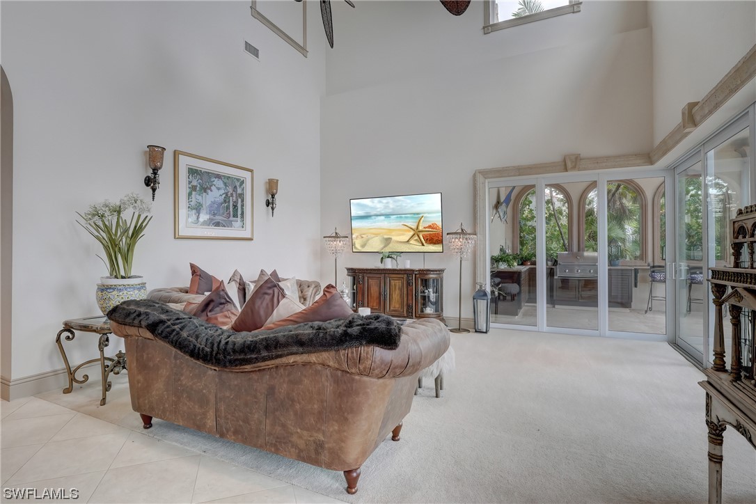5960 Harborage Drive Fort Myers, FL 33908 - Photo 15 of 32 a living room with furniture and a potted plant