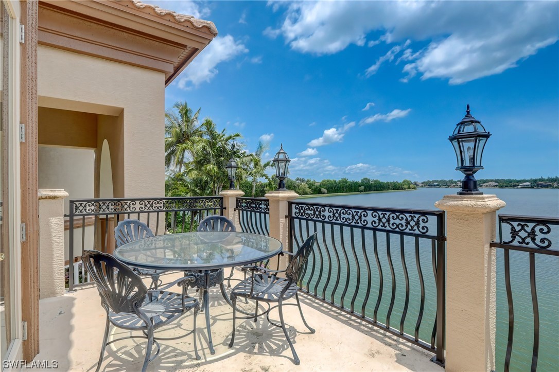 5960 Harborage Drive Fort Myers, FL 33908 - Photo 25 of 32 a view of a chairs and table in the balcony