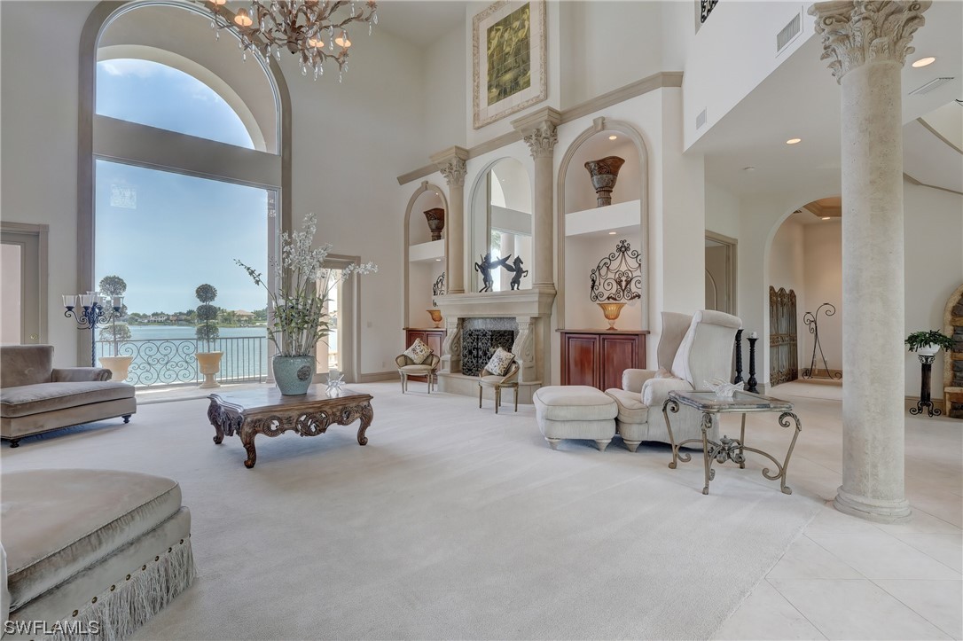 5960 Harborage Drive Fort Myers, FL 33908 - Photo 4 of 32 a living room with furniture and a fireplace