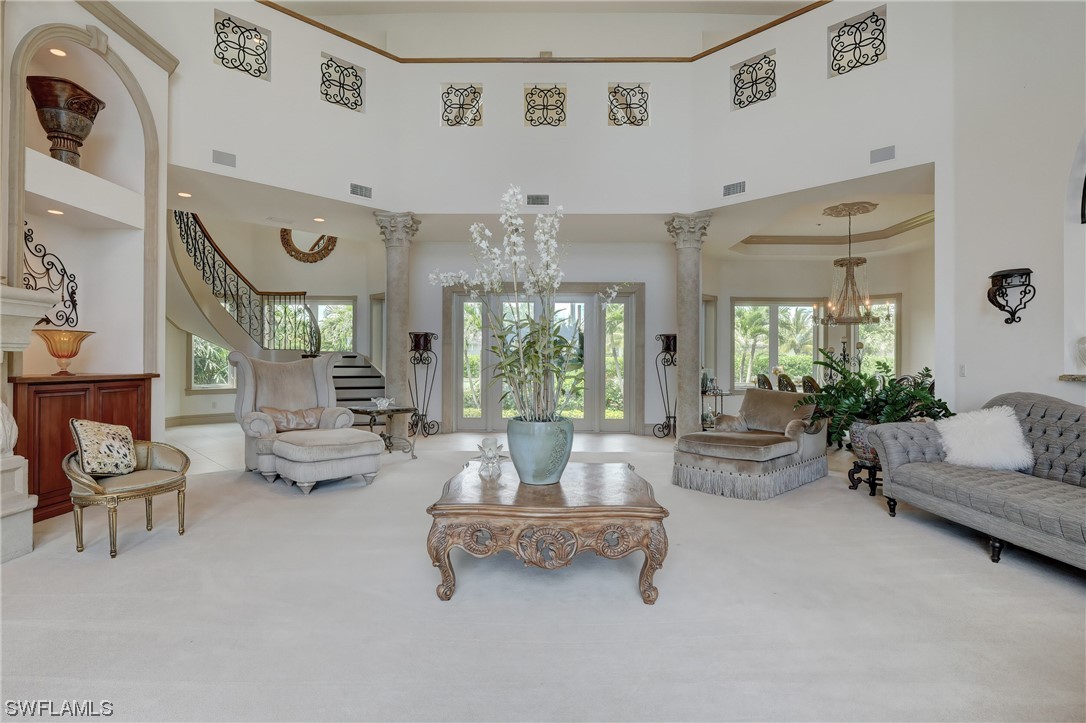5960 Harborage Drive Fort Myers, FL 33908 - Photo 5 of 32 a living room with furniture and a chandelier