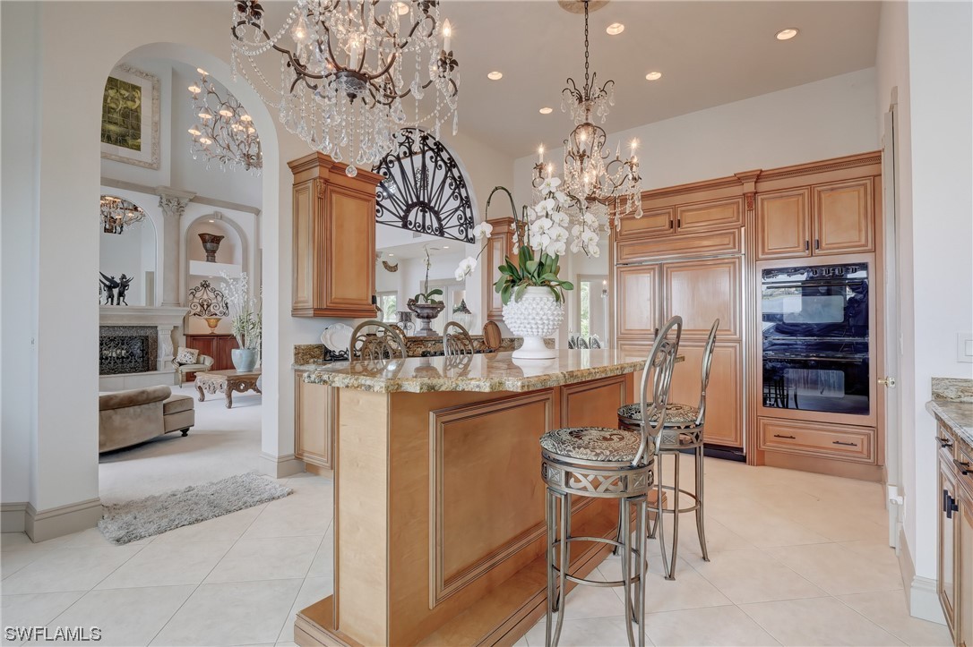 5960 Harborage Drive Fort Myers, FL 33908 - Photo 10 of 32 a dining room filled with furniture and chandelier