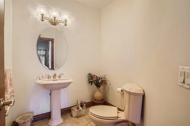 a view of a roof deck with wooden floor and outdoor seating