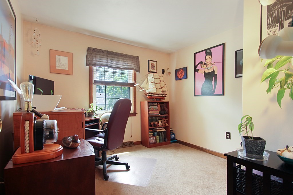 12 Indian Rock Road Haverhill, MA 01832 - Photo 13 of 31 a view of a workspace with furniture and a window