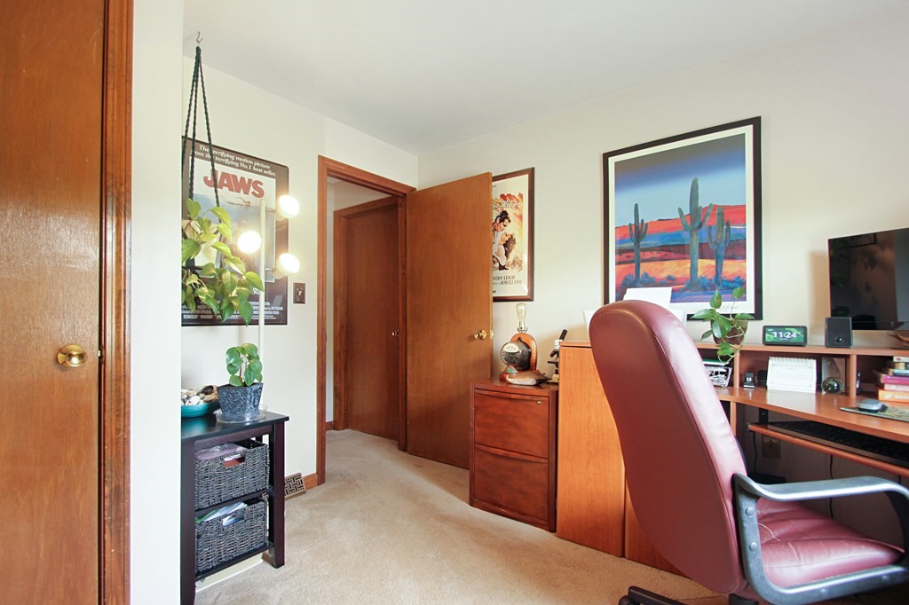 12 Indian Rock Road Haverhill, MA 01832 - Photo 14 of 31 a view of a livingroom with furniture and workspace