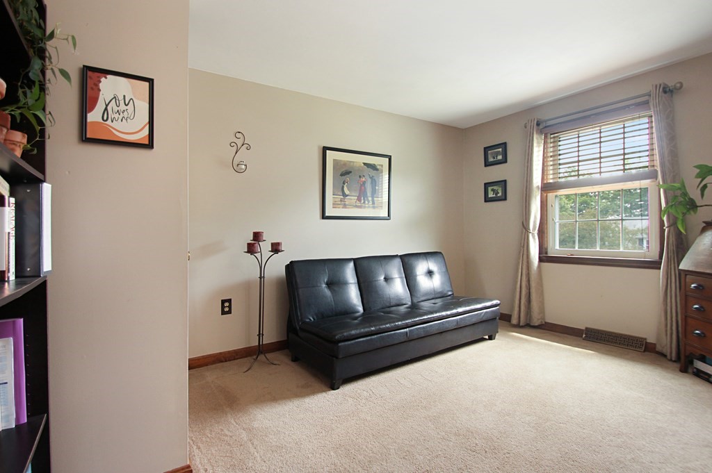 12 Indian Rock Road Haverhill, MA 01832 - Photo 15 of 31 a living room with furniture and a window
