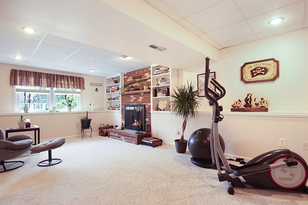 12 Indian Rock Road Haverhill, MA 01832 - Photo 20 of 31 a view of a room with gym equipment