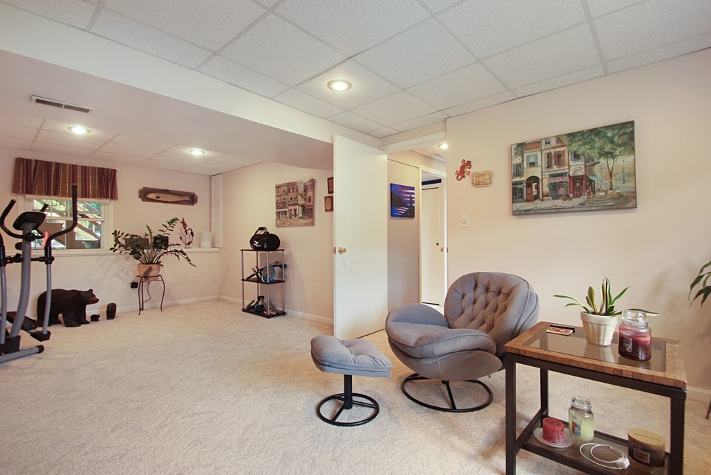 12 Indian Rock Road Haverhill, MA 01832 - Photo 21 of 31 a view of a livingroom with furniture and a window