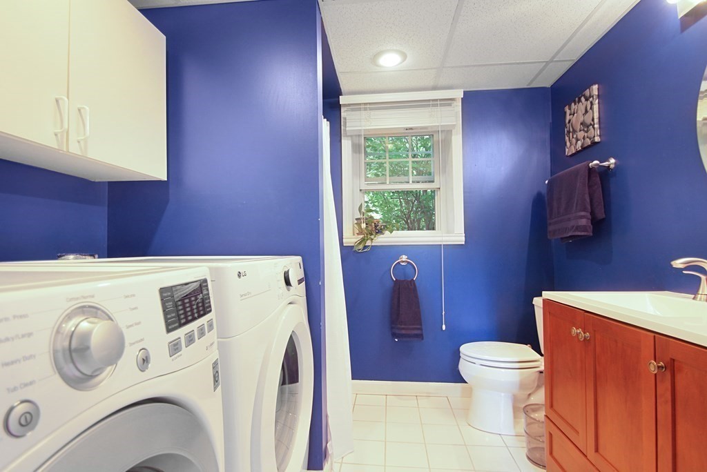 12 Indian Rock Road Haverhill, MA 01832 - Photo 24 of 31 a view of bathroom with a washer and dryer