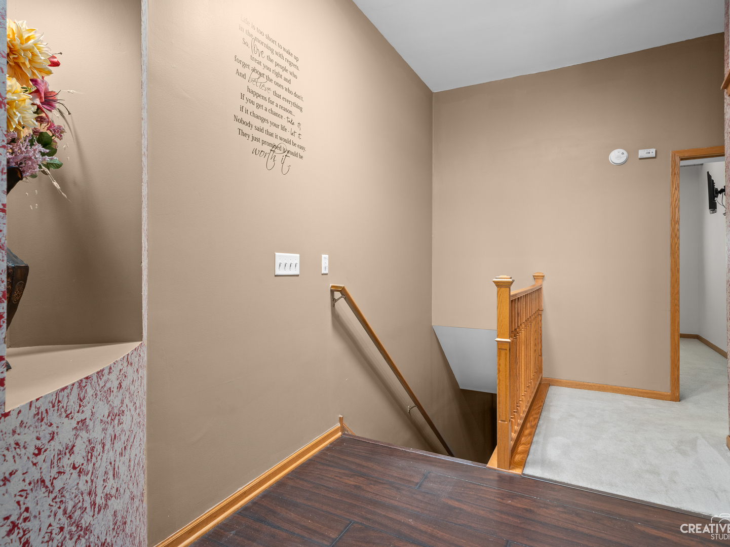 1716 Simms Street Aurora, IL 60504 - Photo 22 of 29 a view of a hallway with wooden floor