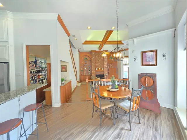 a dining room with furniture and window