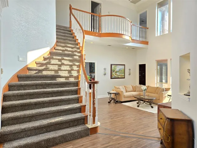a view of entryway livingroom and hall