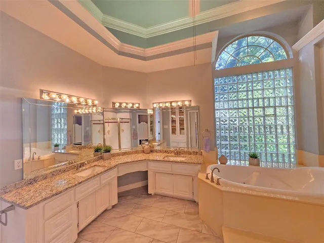 a large kitchen with a large window