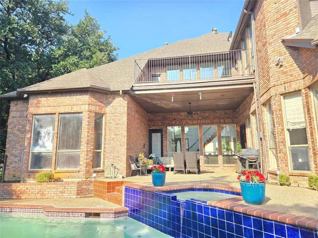 a front view of house with outdoor seating