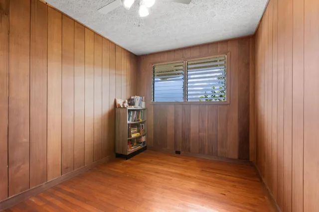 an empty room with a empty space and a window