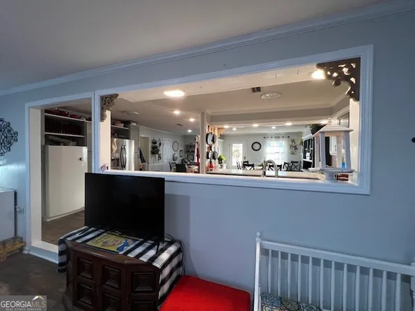 a living room with furniture and a window
