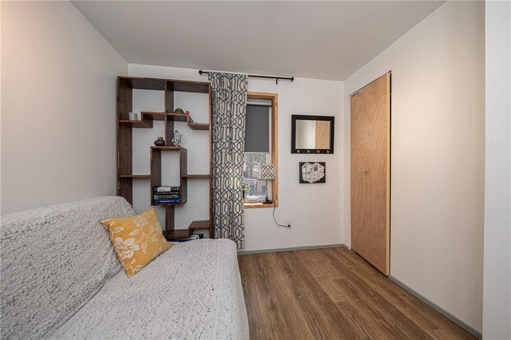 7608 Cheyenne Street Pittsburgh, PA 15218 - Photo 23 of 33 a bedroom with a bed and a window