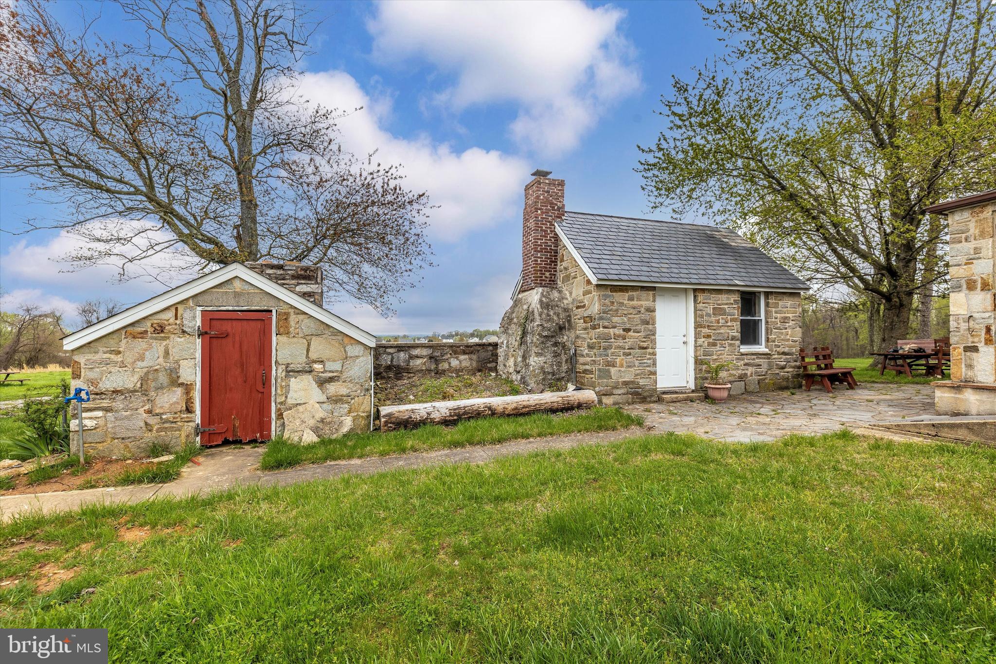 1021 Saffell Road Reisterstown, MD 21136 - Photo 8 of 57 a front view of a house with a yard and trees