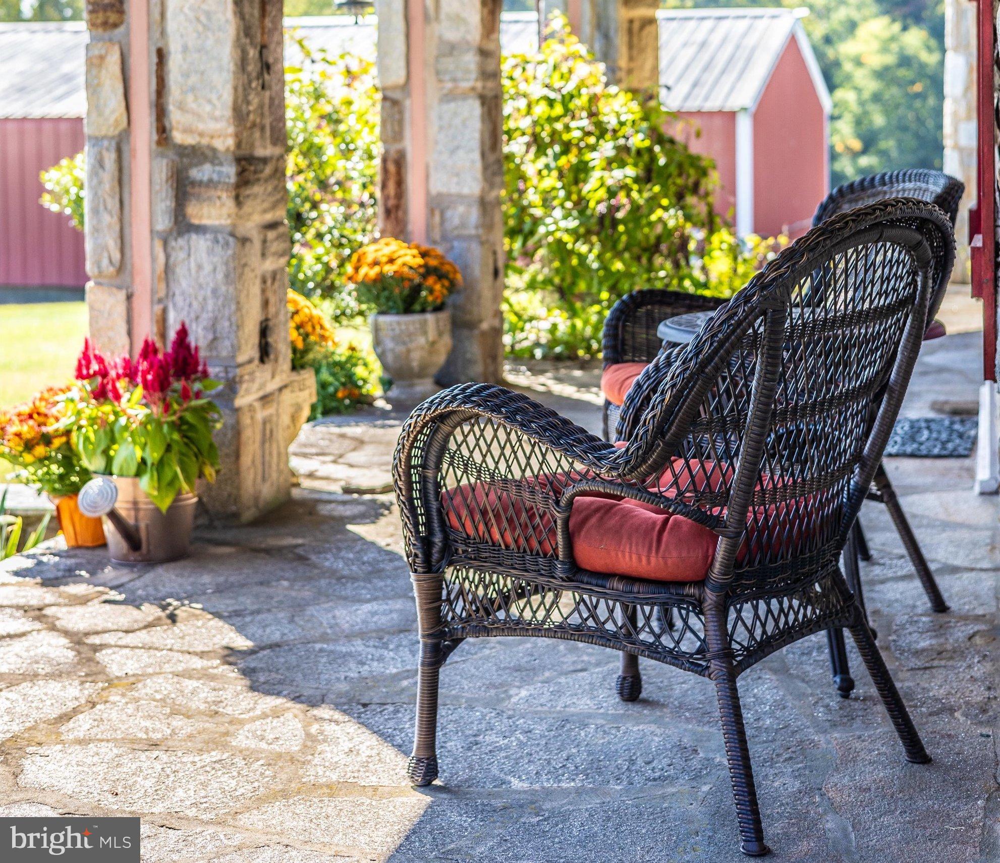 1021 Saffell Road Reisterstown, MD 21136 - Photo 10 of 57 a view of a chairs and table in back yard of the house
