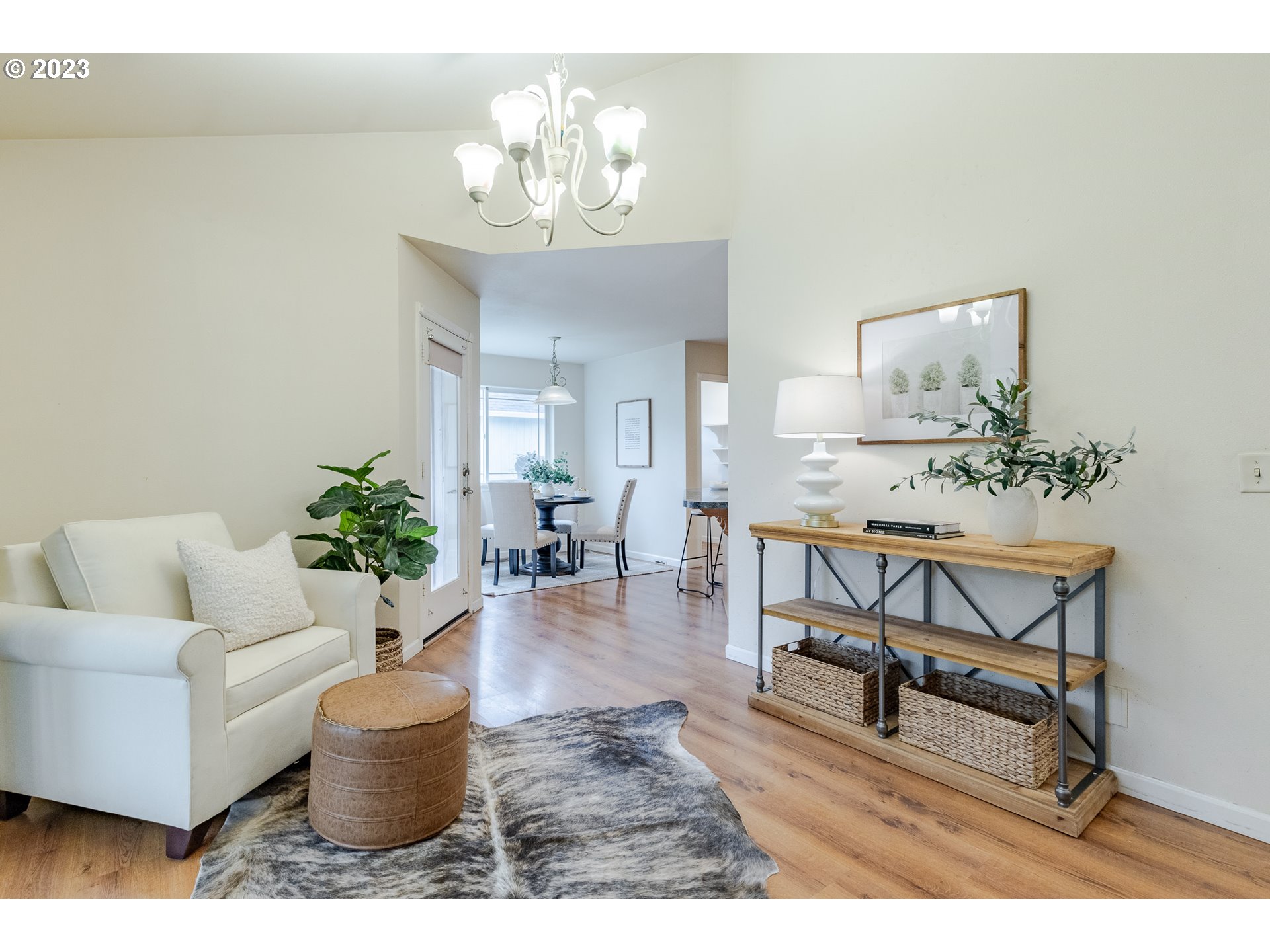 968 S Street Springfield, OR 97477 - Photo 11 of 42 a living room with furniture and a chandelier