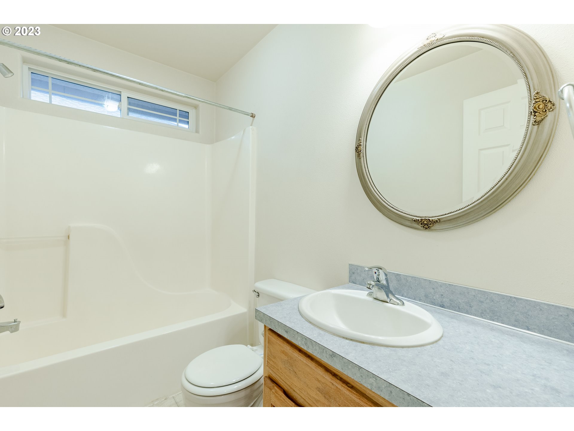 968 S Street Springfield, OR 97477 - Photo 31 of 42 a bathroom with a sink and a mirror