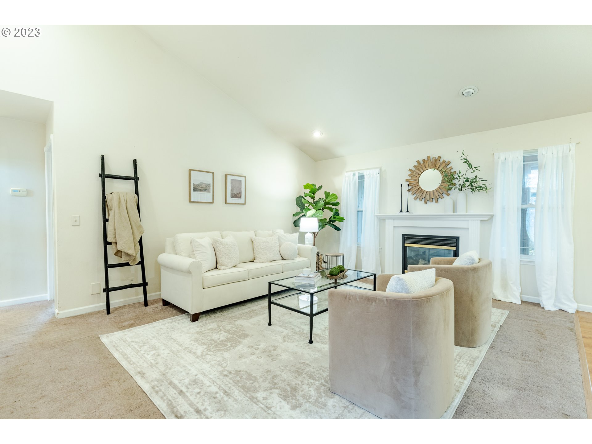 968 S Street Springfield, OR 97477 - Photo 5 of 42 a living room with furniture a fireplace and a potted plant