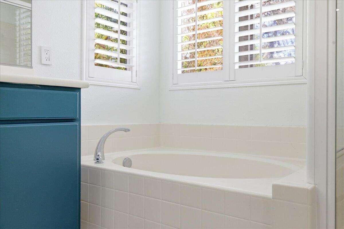 23732 Bella Vista Road Corona, CA 92883 - Photo 24 of 49 a white bath tub sitting next to a window