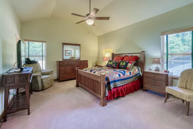 a bed room with a bed and a couch