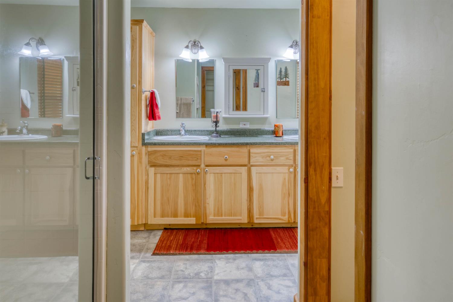 33855 Shaver Springs Road Auberry, CA 93602 - Photo 28 of 41 a bathroom with a sink and a mirror