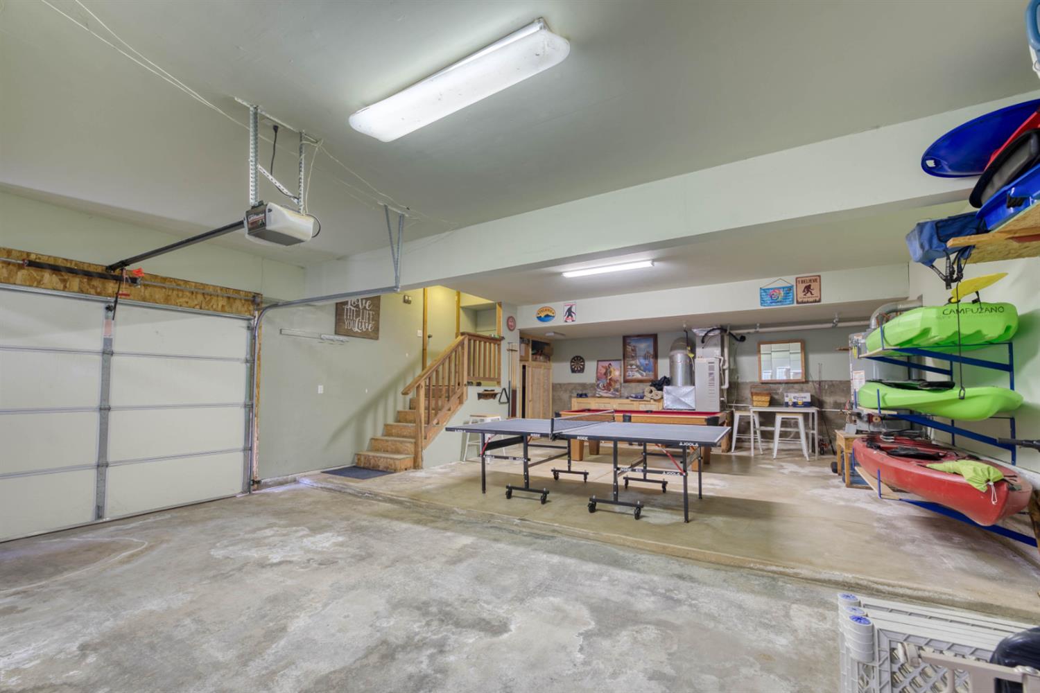 33855 Shaver Springs Road Auberry, CA 93602 - Photo 36 of 41 a view of a play room with furniture and a garage