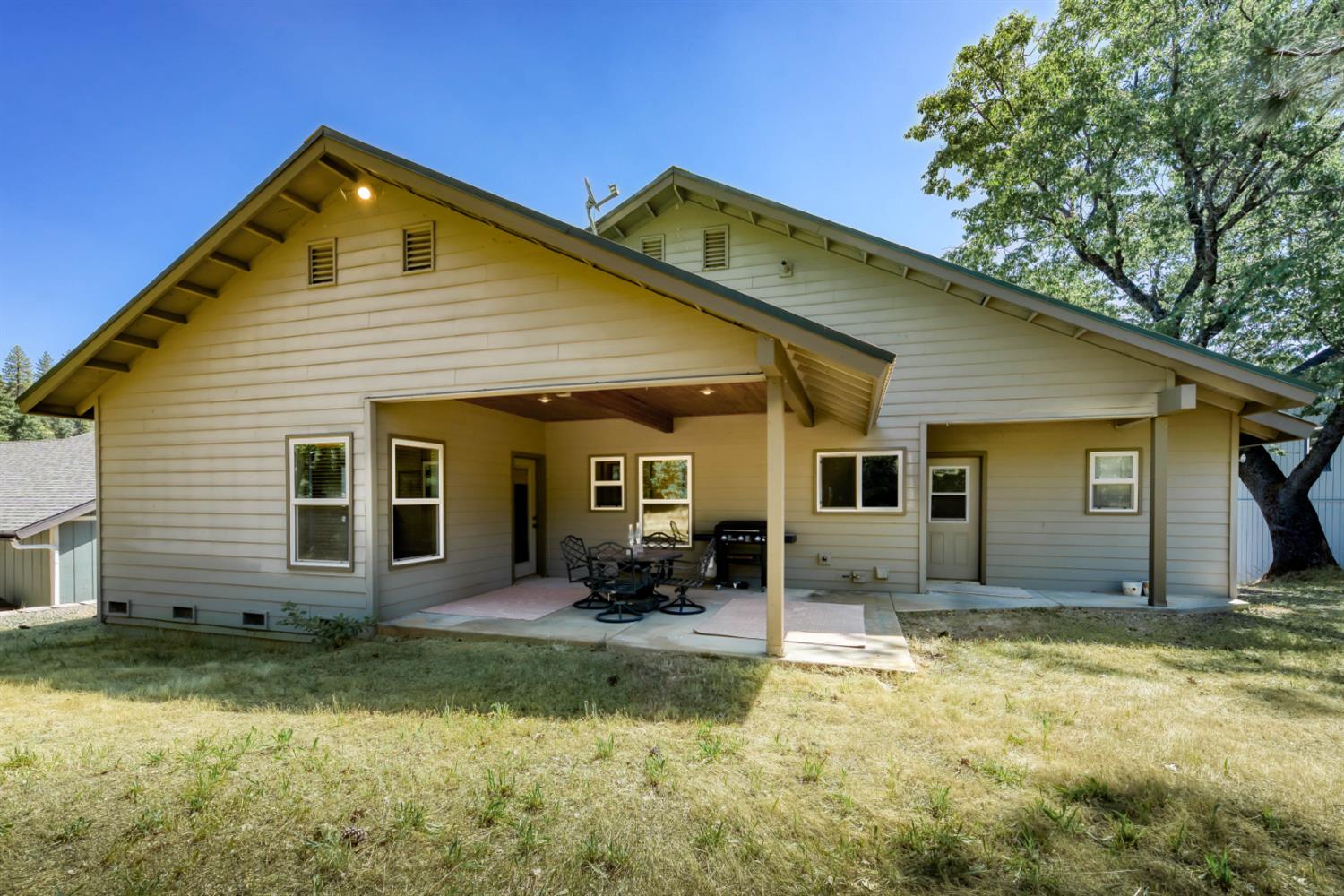 33855 Shaver Springs Road Auberry, CA 93602 - Photo 4 of 41 a front view of house with yard outdoor seating and pathway