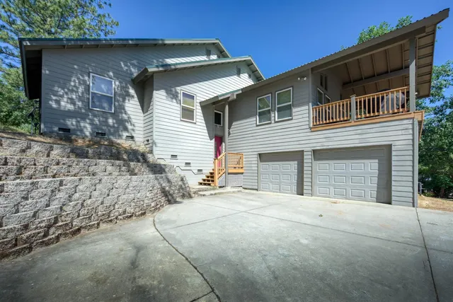 a front view of a house with a garage