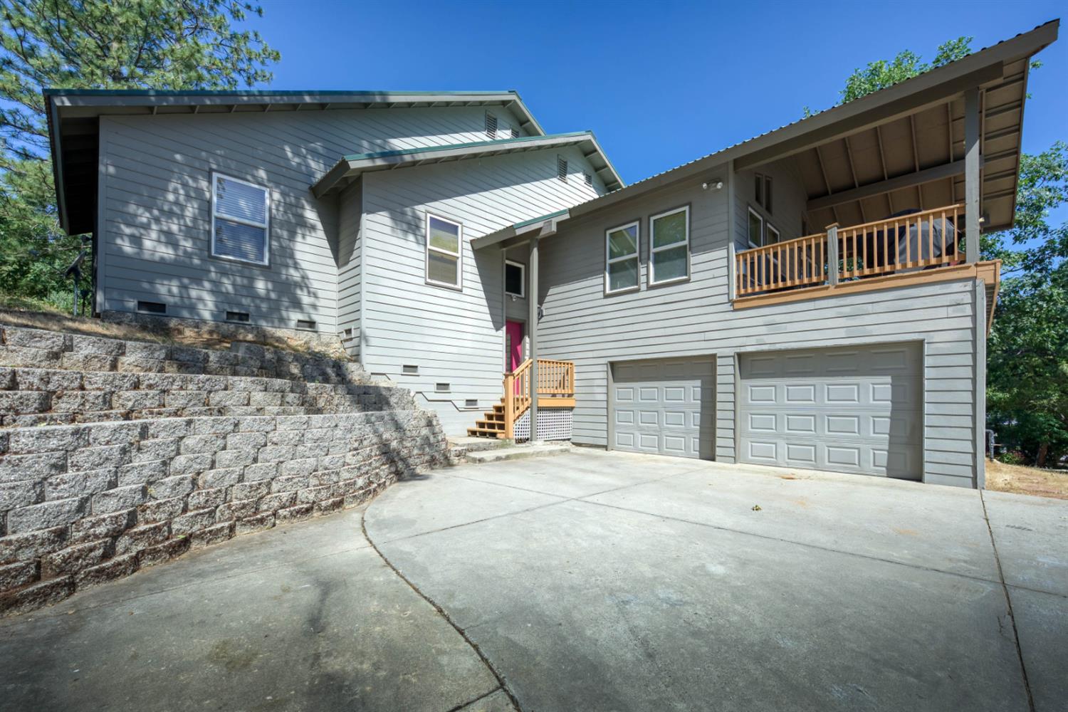 33855 Shaver Springs Road Auberry, CA 93602 - Photo 10 of 41 a front view of a house with a garage