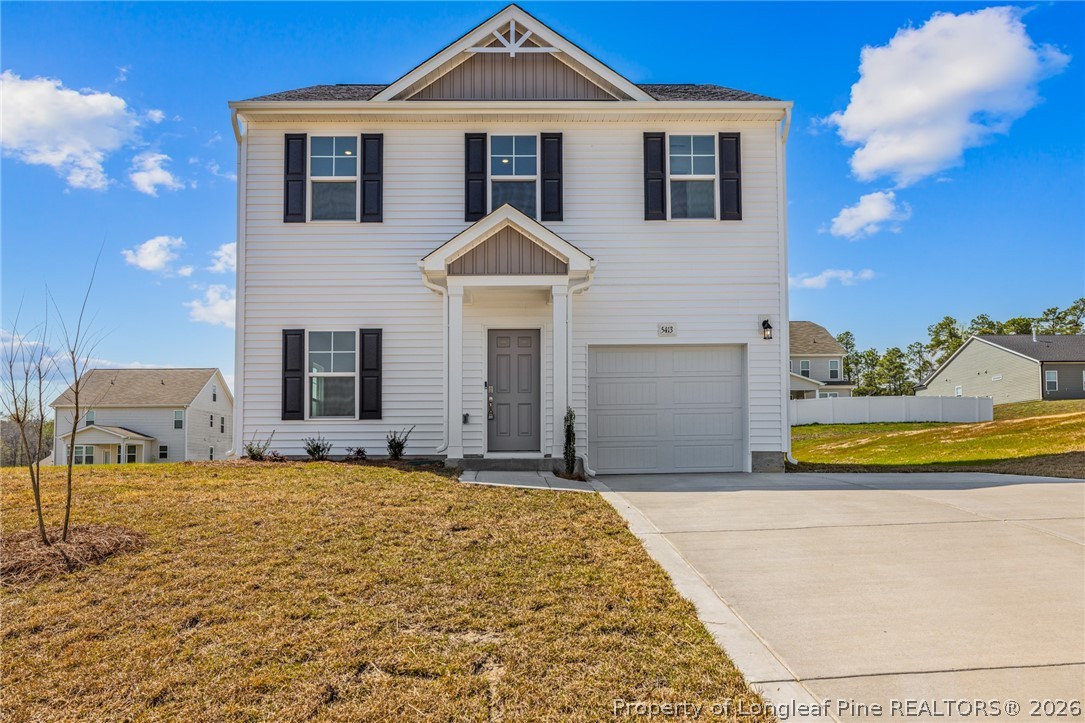 5413 Short Leaf Road Fayetteville, NC 28311 - Photo 1 of 33 a front view of a house with a swimming pool
