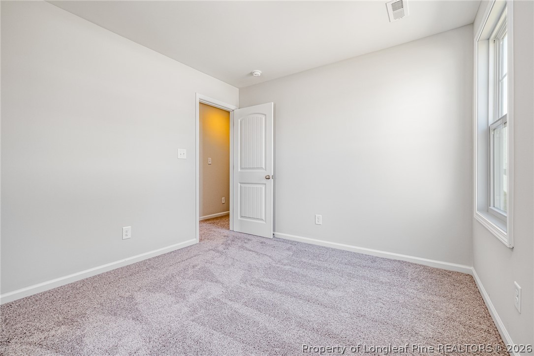 5413 Short Leaf Road Fayetteville, NC 28311 - Photo 13 of 33 a view of an empty room
