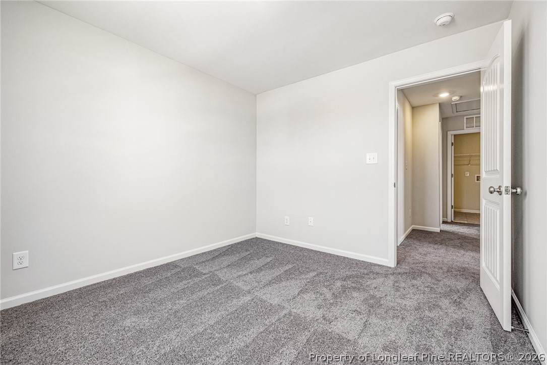 5413 Short Leaf Road Fayetteville, NC 28311 - Photo 16 of 33 an empty room with an entryway